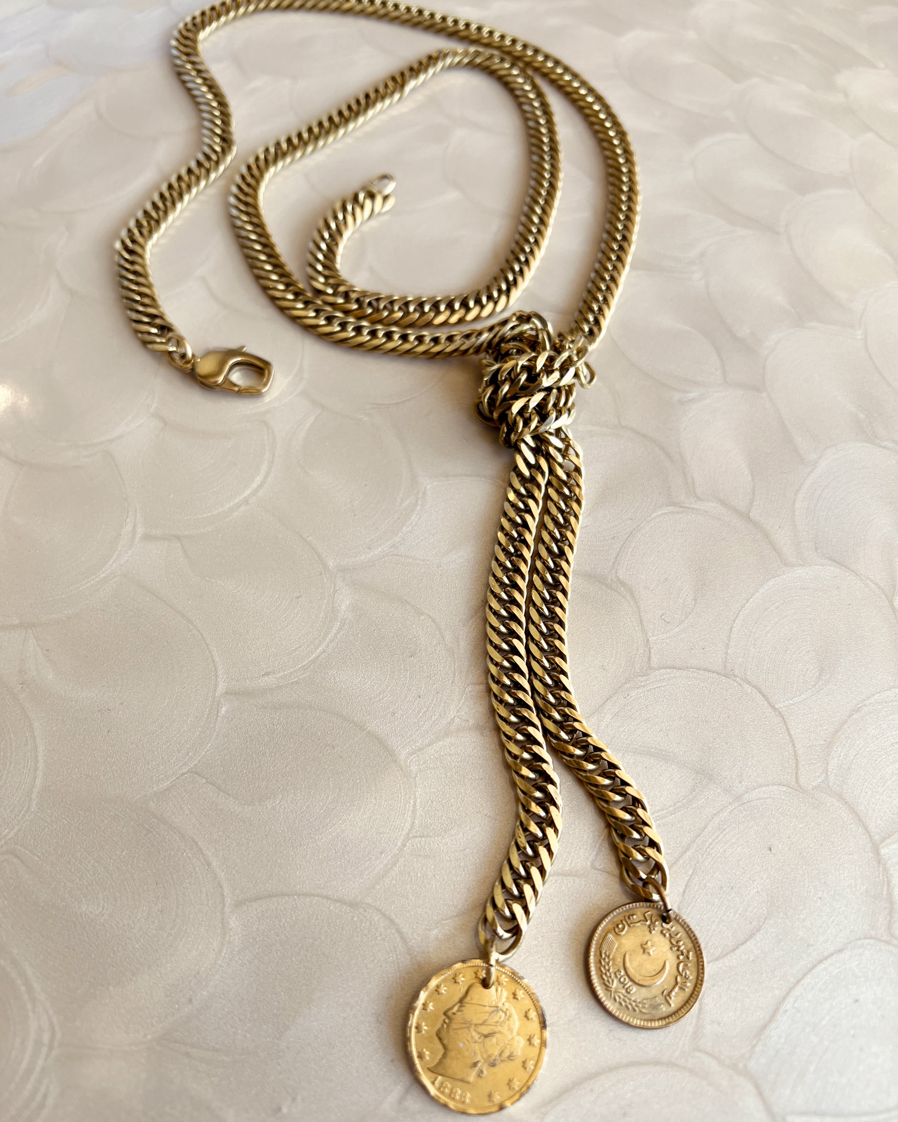 Knotted Chain with Coins